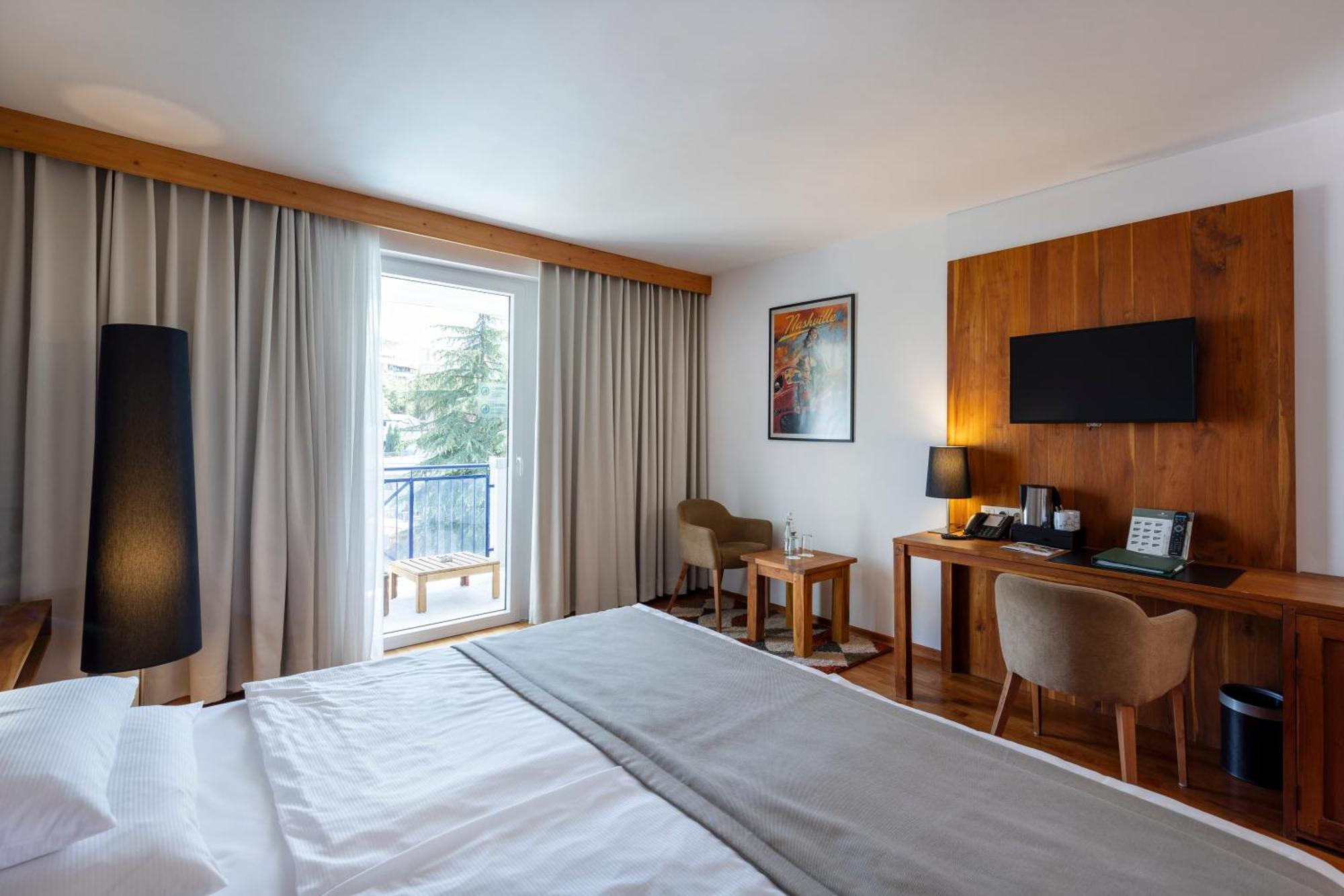 Rogner Hotel Tirana Cameră foto A room at the hotel